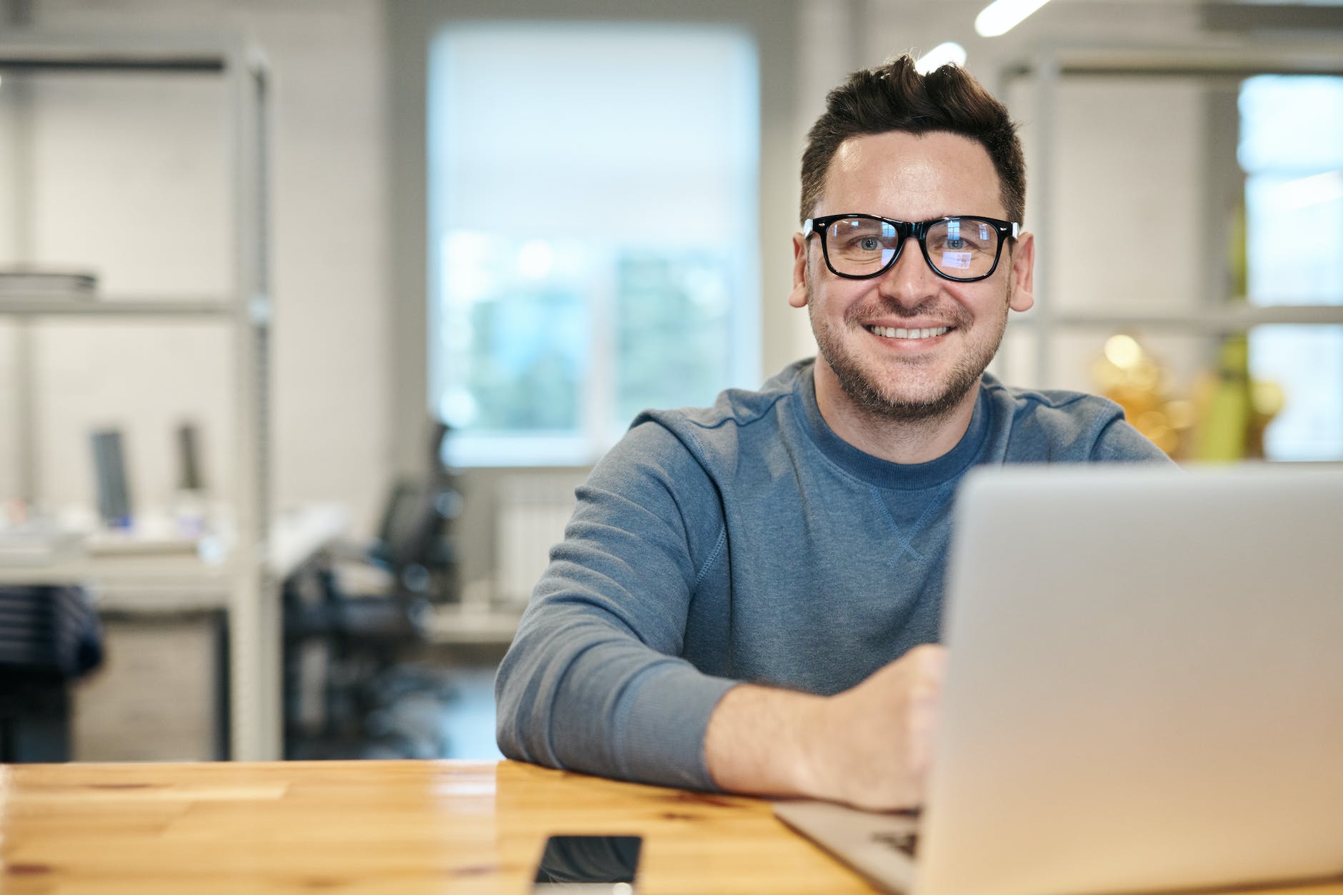 photo of man wearing eyeglasses